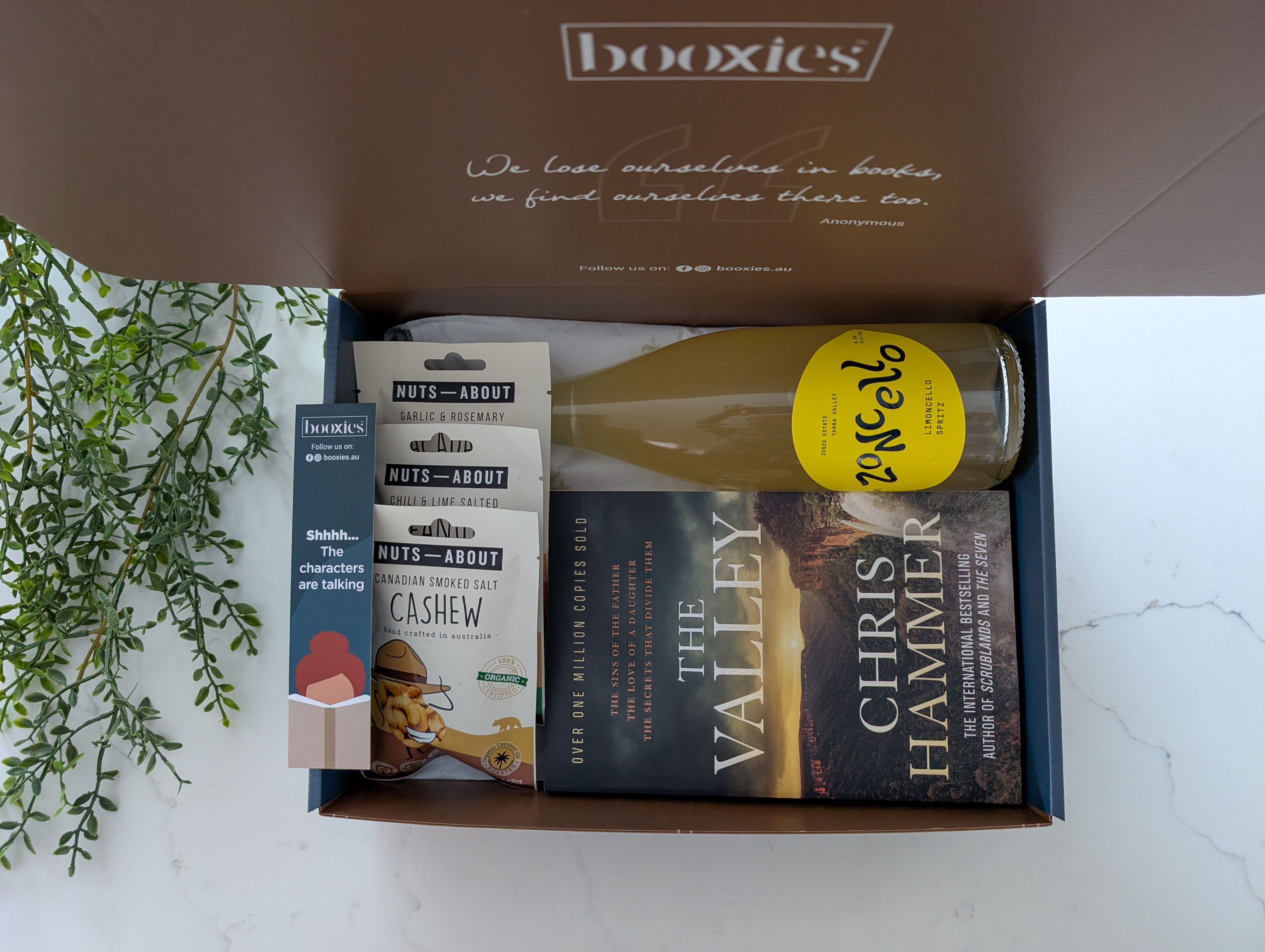 Fizz & Fiction curated booxies including limoncello and roasted nuts