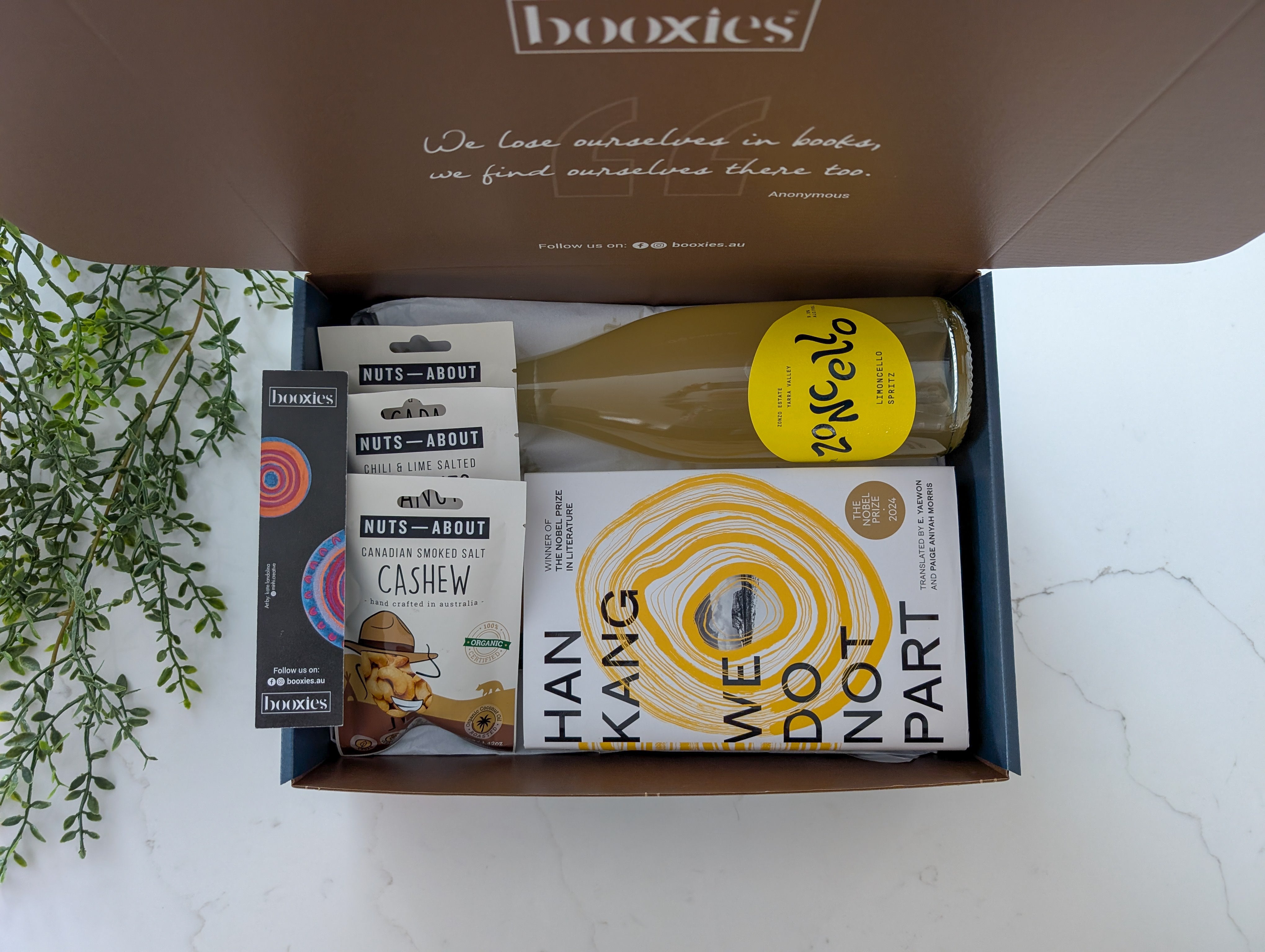 Fizz & Fiction curated booxies including limoncello and roasted nuts