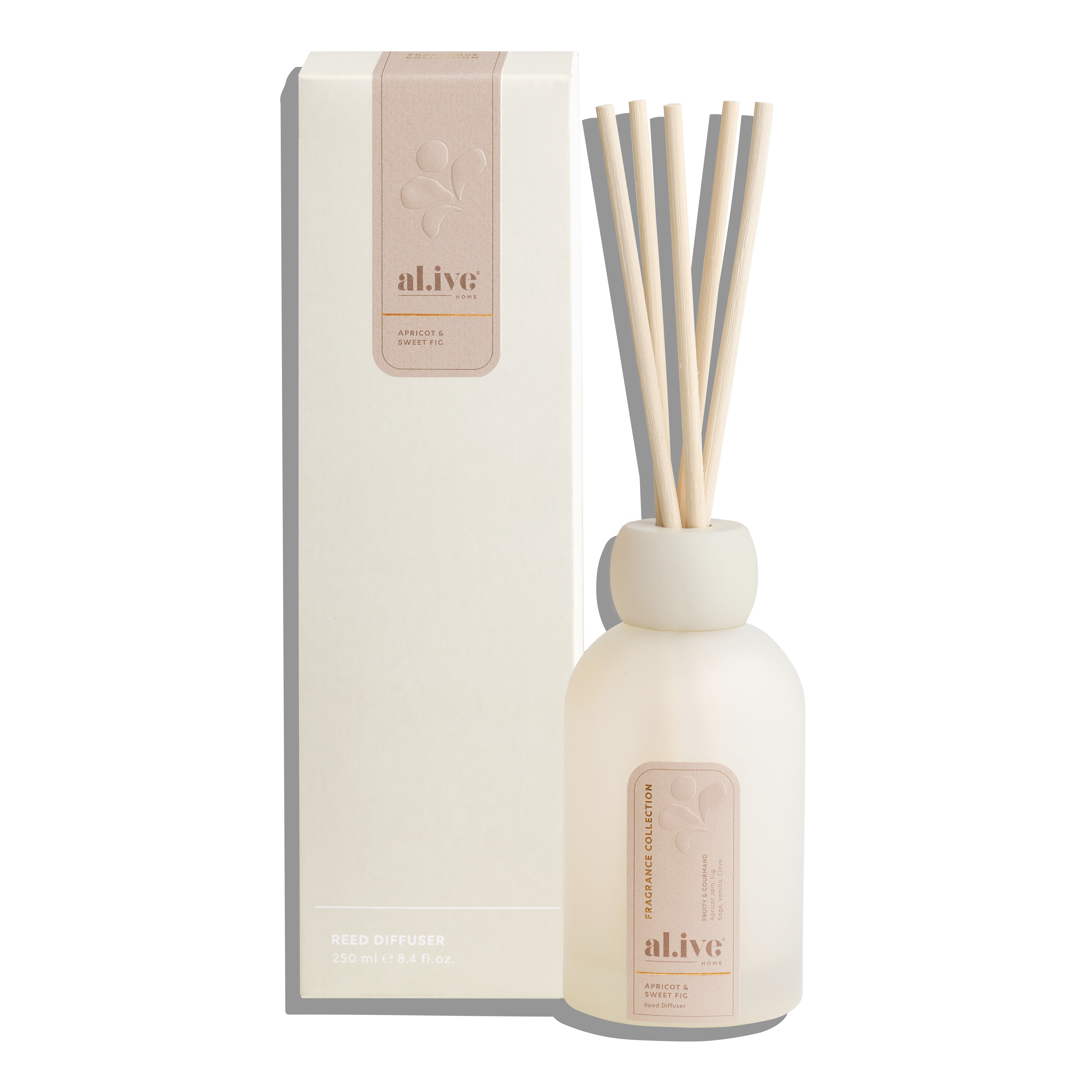 White diffuser bottle with sticks and packaging labeled 'alive' on a white background