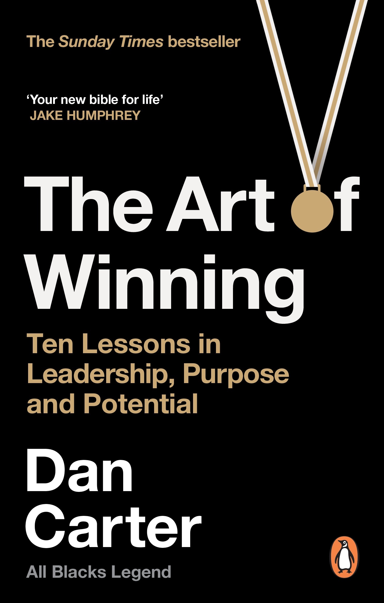 Book cover of 'The Art of Winning' by Dan Carter with a black background and gold medal.