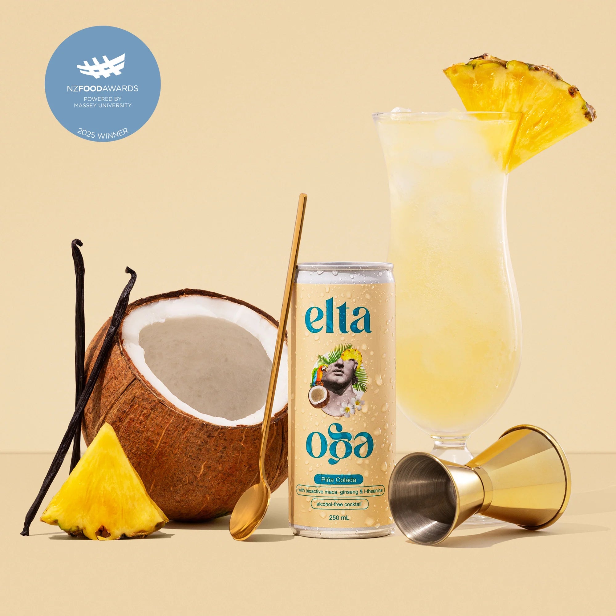Eltá drink can with a glass of pineapple juice, coconut, vanilla beans, and a pineapple wedge on a beige background.
