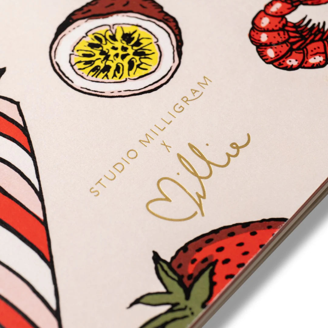 Product packaging with illustrations of a boiled egg, strawberry, and other elements, featuring the brand 'Studio Milligram'.