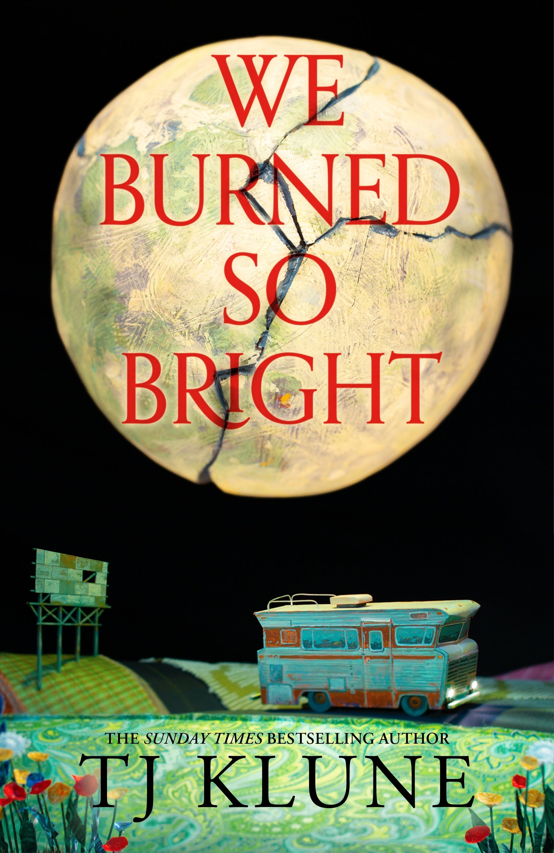 Book cover of 'We Burned So Bright' by TJ Klune with a cracked moon and small buildings.